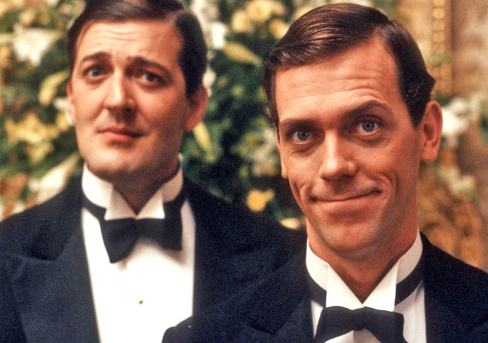 Hugh Laurie as Bertie Wooster and Stephen Fry as Jeeves in an episode from ITV's 90s series 'Jeeves and Wooster' ( Rex Features )